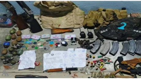 العراق.. القبض على متهم في الأنبار بحوزته أختام ومعاملات مزورة وأسلحة